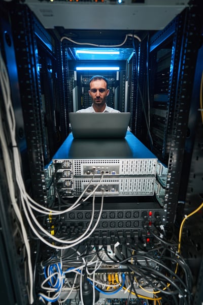 caucasian-data-center-technician-doing-security