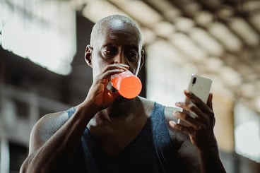 athlete-looking-at-phone