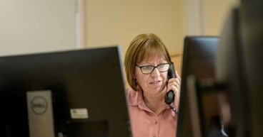 office-woman-phone_1200x630_og_compressed